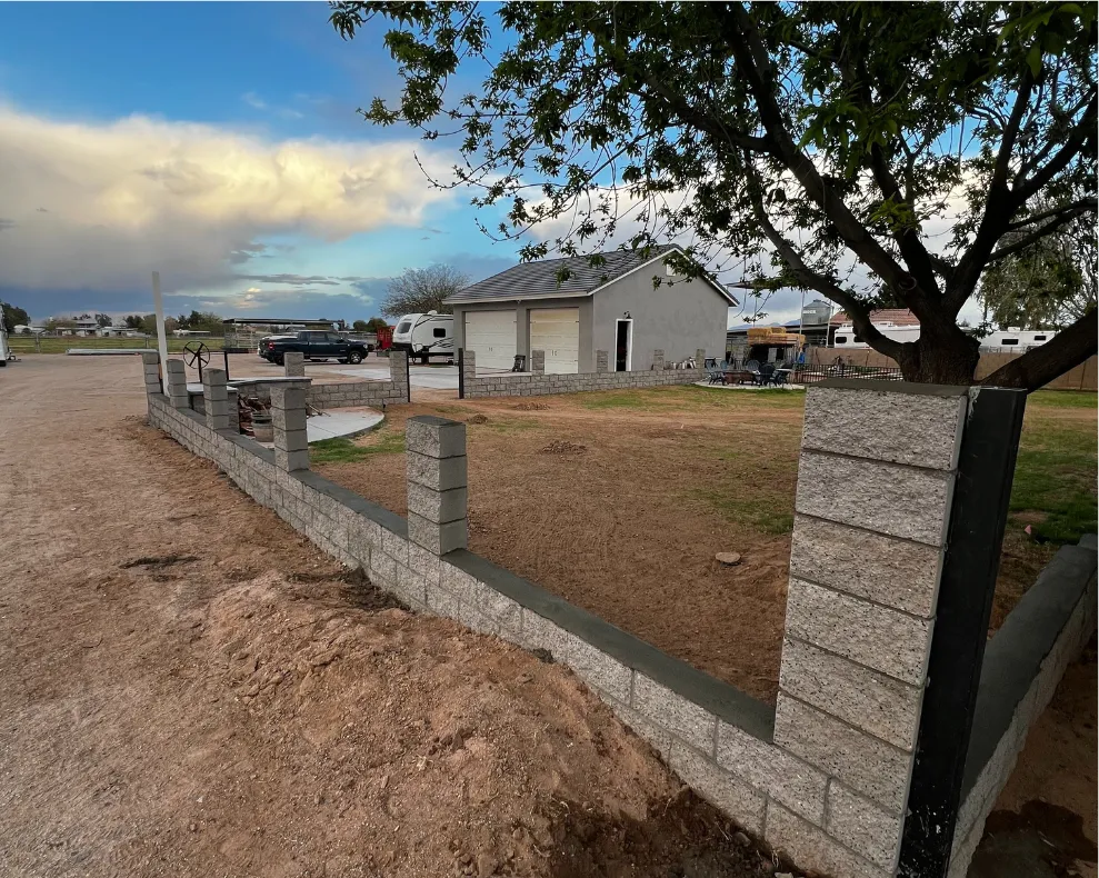 Block wall with pillars built by our featured contractor